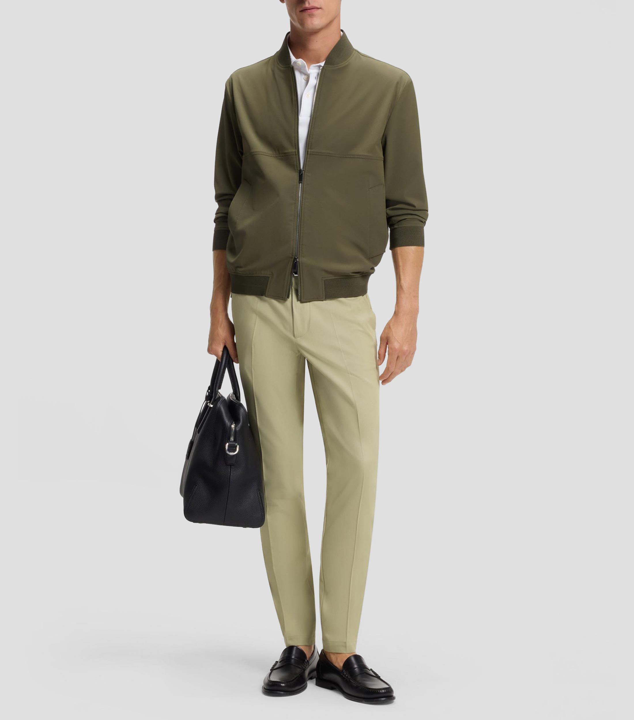 Pantalones slim fit en tejido multielástico Hombre